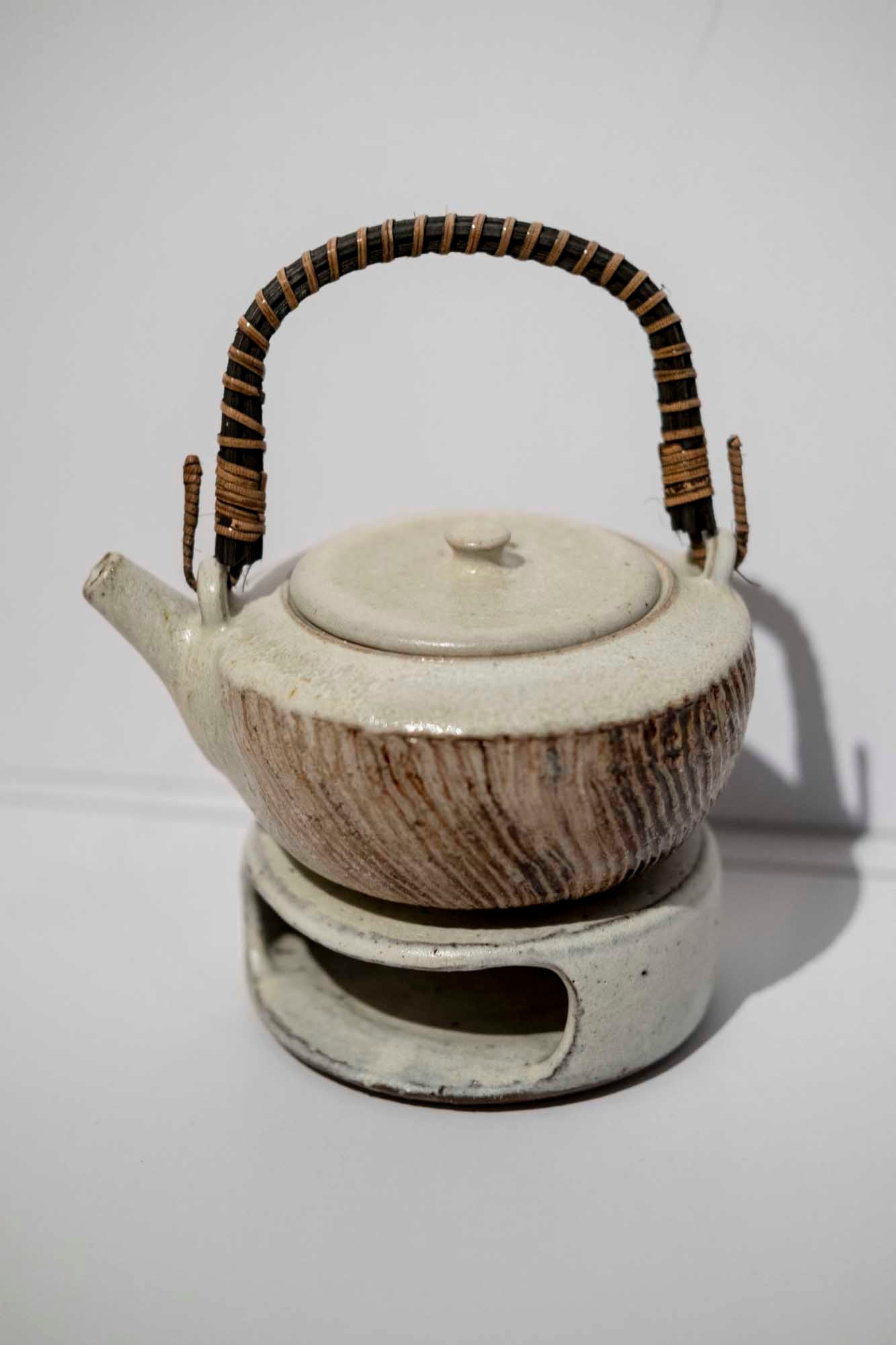 Rattan Carved Oxide Teapot