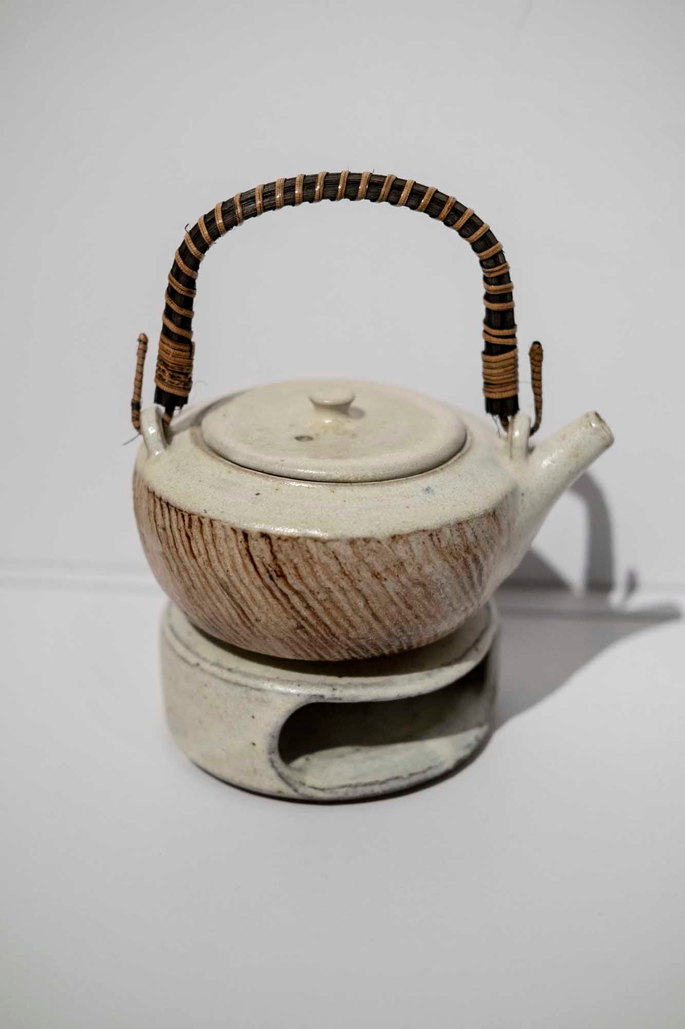 Rattan Carved Oxide Teapot